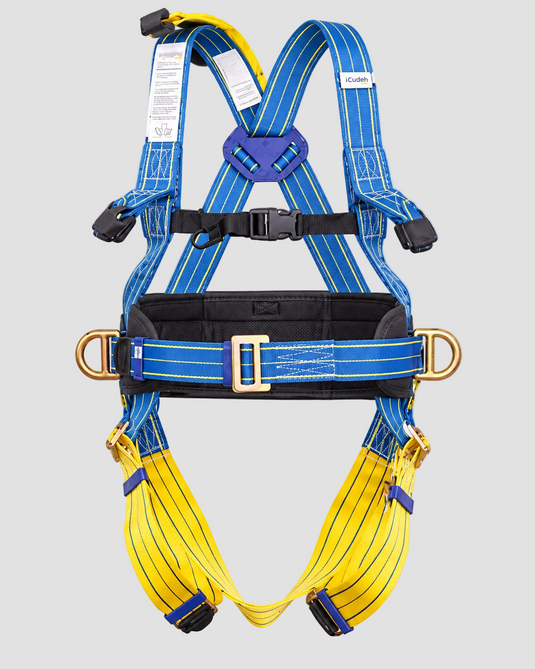A high-visibility safety harness with blue and yellow webbing, black padding, gold metal D-rings, and a black quick-release buckle, shown against a neutral gray background.