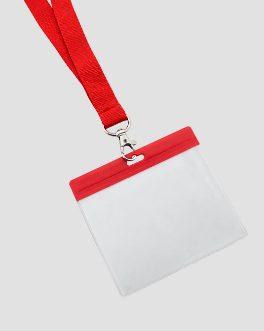 A clear plastic ID badge holder with a red top border and a red lanyard strap, attached with a silver metal clasp, on a light gray background.