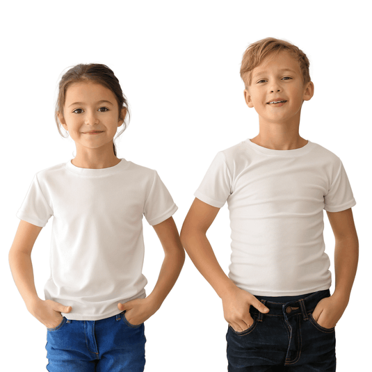 Two children, a girl on the left in a white t-shirt and blue jeans, and a boy on the right in a white t-shirt and dark pants, standing side by side with hands in pockets.